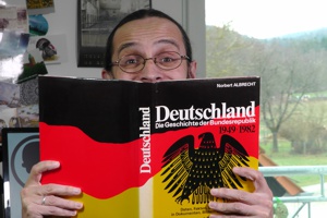 A photo of Andrew reading up on German history. (47kB)